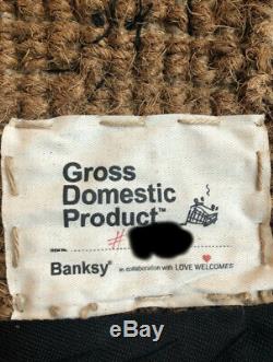 Banksy Gross Domestic Product Welcome Matt In Hand