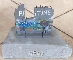 Two (2) BANKSY Walled Off Hotel DEFEATED Wall Section Souvenir Sculptures