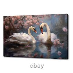 Beau couple de cygnes sur une toile d'impression au lac, art d'une scène printanière paisible.