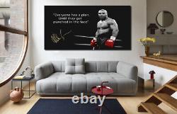 Impression d'art sur toile encadrée de la célèbre citation de Mike Tyson, prête à être accrochée.